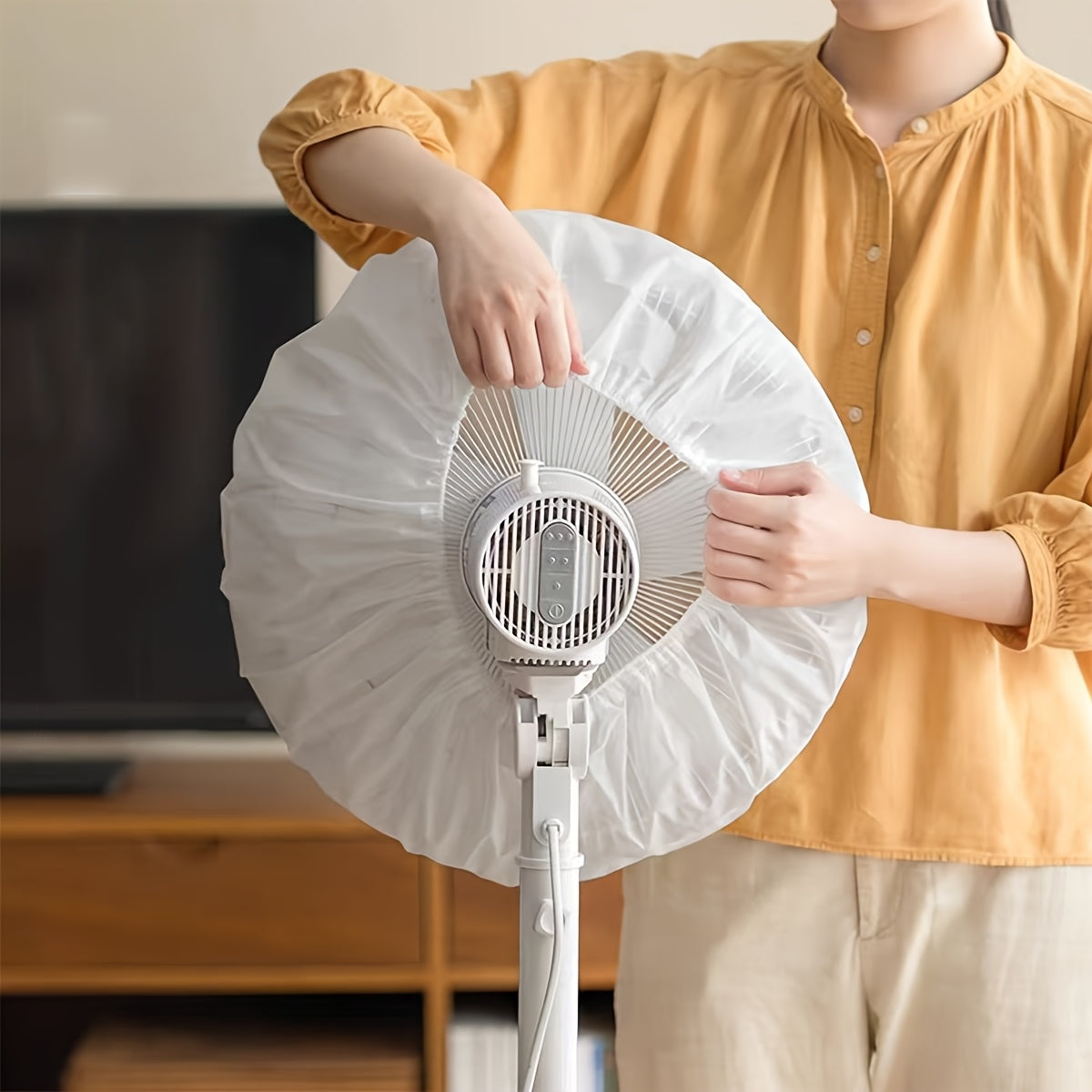 Protect your modern fan with this dust cover protector. Made from plastic, it provides full and half coverage and is safe for non-food contact. It includes a hand guard and fits universally for home and office fans.