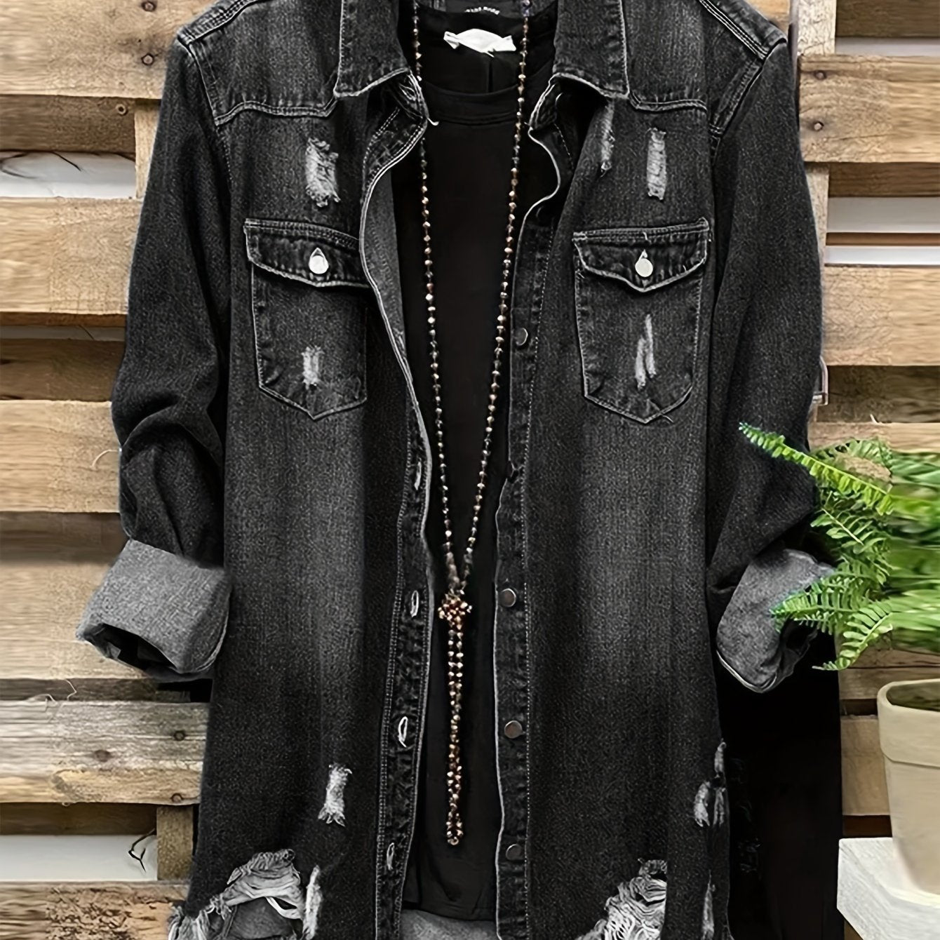 Women's oversized denim jacket with asymmetrical hem, lapel collar, and raw hem detail. Made from non-stretch 100% fabric, suitable for all seasons.