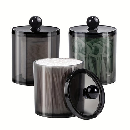 10 oz black plastic apothecary jar for bathroom storage of cotton balls, swabs, rounds, floss picks, hair clips, and ties.