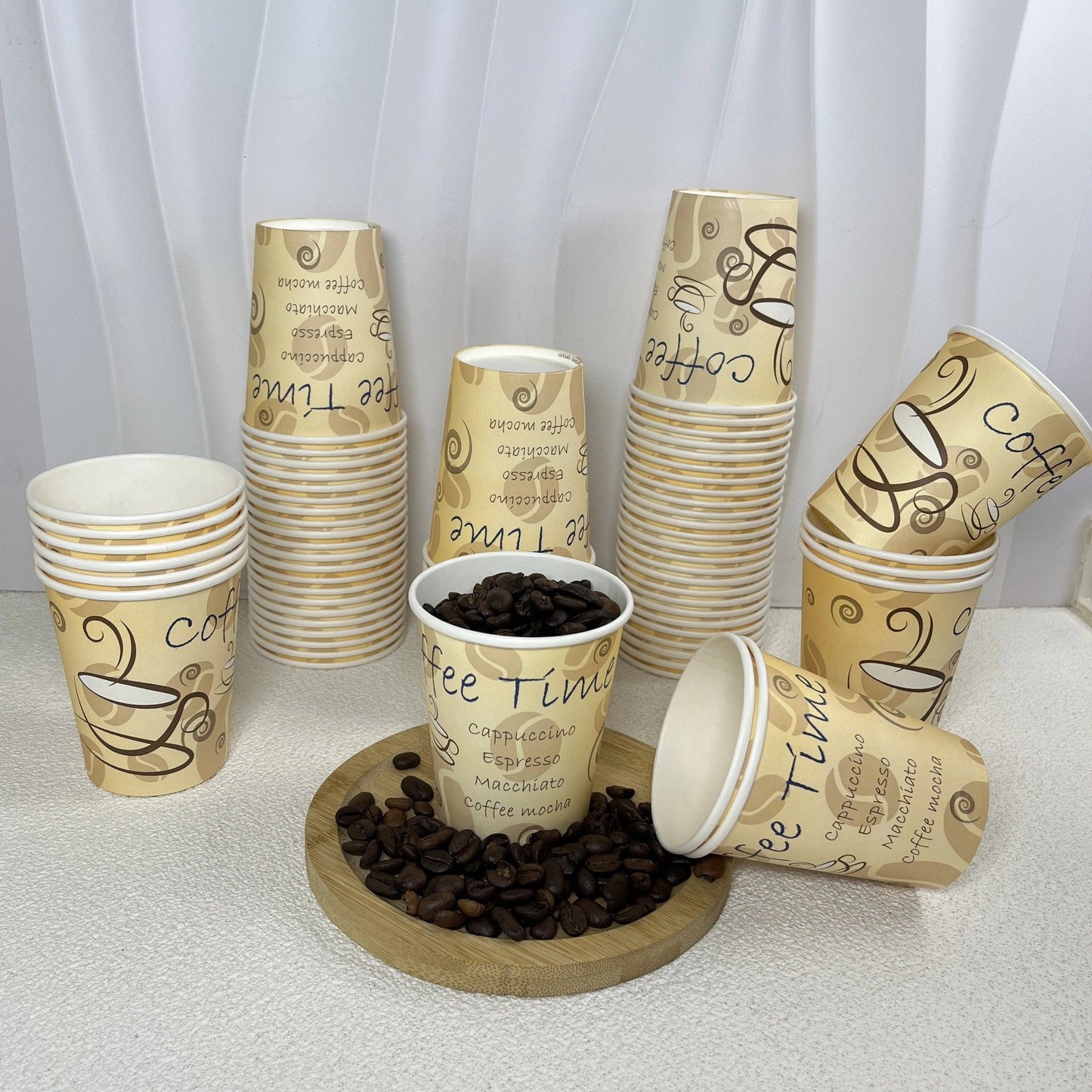 50 to 100 pieces of 8-ounce disposable paper cups ideal for household and commercial use. These hot drink paper cups are food-grade and perfect for coffee, juice, or water. Suitable for home and supermarket tastings, as well as lattes and milk teas.