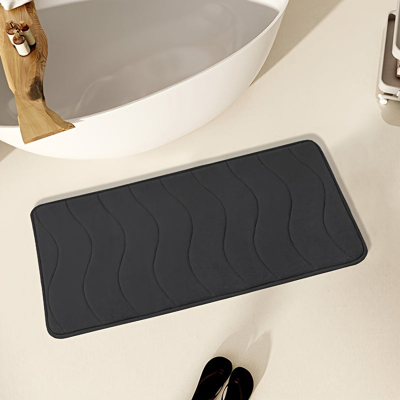 Soft and comfortable bath mat with high absorbency - ideal for bathrooms, showers, and bathtubs. Rectangular in shape, waterproof, and easy to clean.