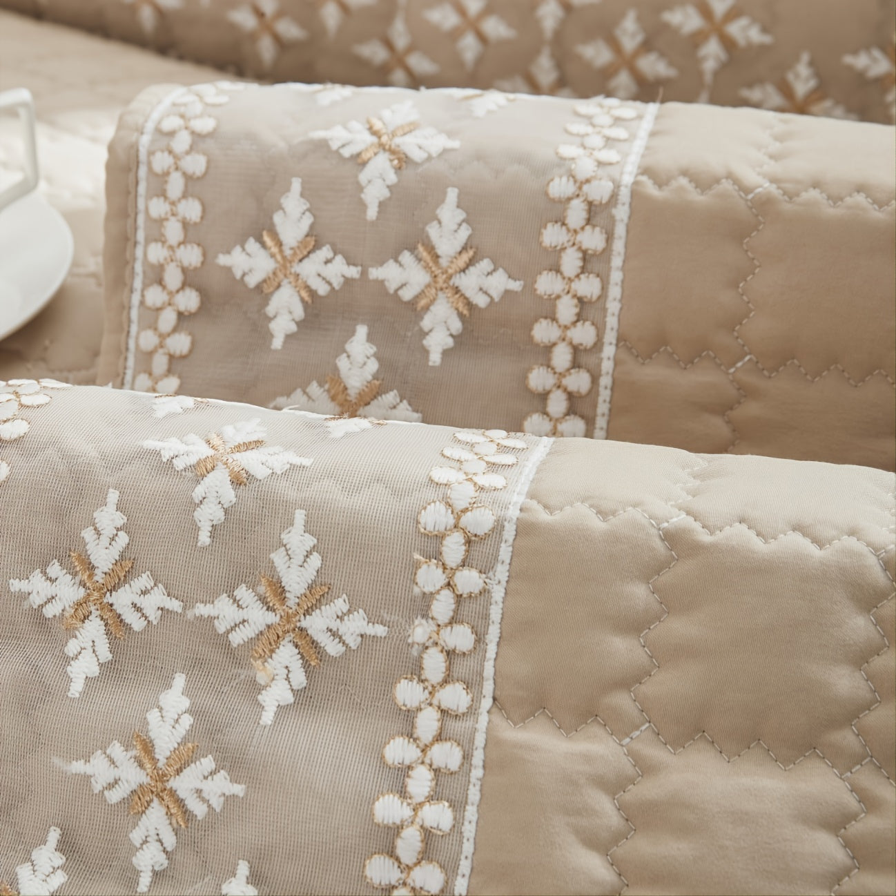 Quilted lace sofa covers for sectional sofas, protecting furniture and enhancing home decor.