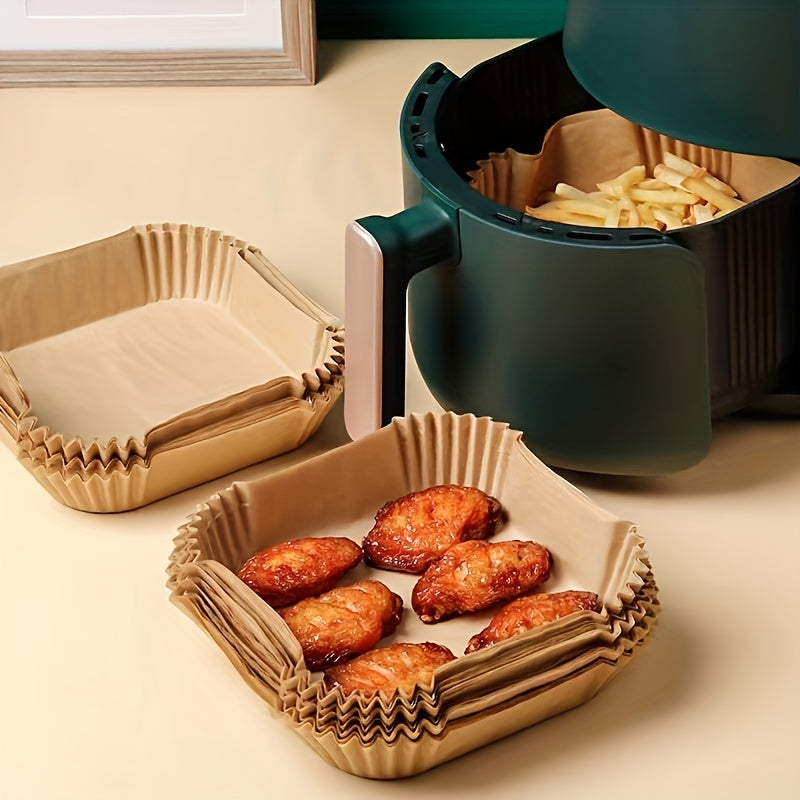 Disposable Air Fryer Liners available in packs of 30, 50, or 100 pieces. These liners come in two sizes, 16.0cm and 20.07cm, and can be used as Paper Air Fryer Liner Pots, Paper Basket Bowls, Baking Trays, and Oven Accessories. They are essential Baking