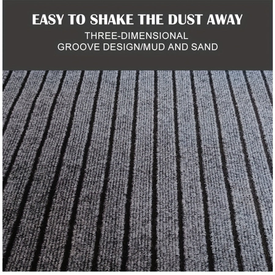 Household mat in gray stripes, designed to prevent slipping and repel dust and stains. Suitable for indoor, kitchen, and bedroom use. Can be cut to size with options available in various dimensions (101.6cm x 152.4cm, 127.0cm x 203.2cm, 114.3cm x 3.05m