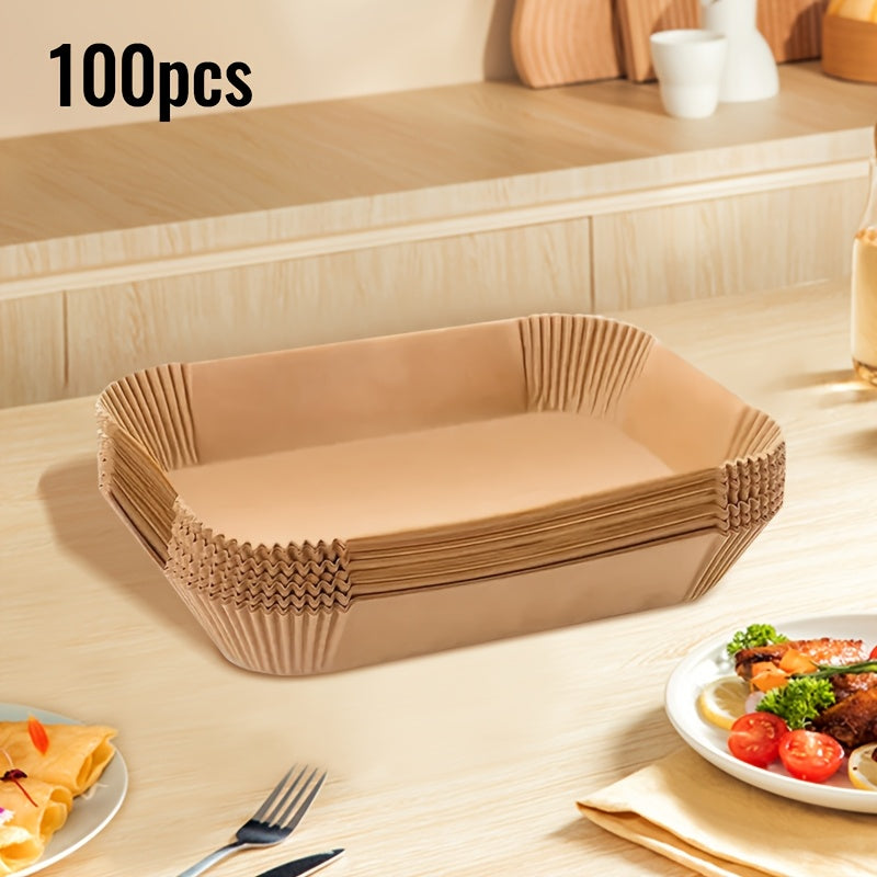 Large Rectangular Silicone Paper Air Fryer Liners, available in 50 or 100 packs. These non-stick, easy to clean liners are oven safe and perfect for baking, cooking, and serving food. A convenient and space-saving kitchen tool for home chefs.