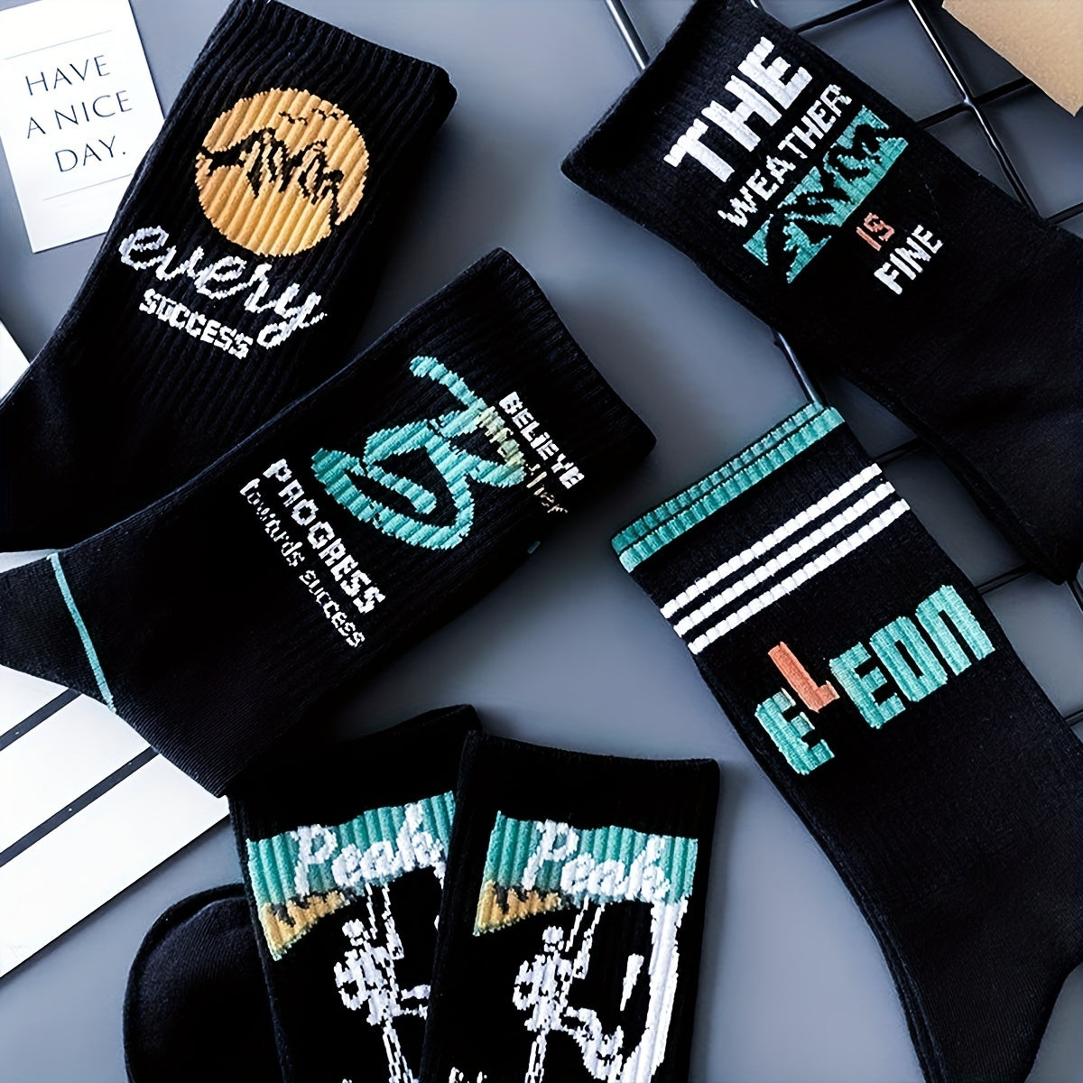 5/10 pairs of men's trendy crew socks with graffiti letter patterns, suitable for outdoor wear.