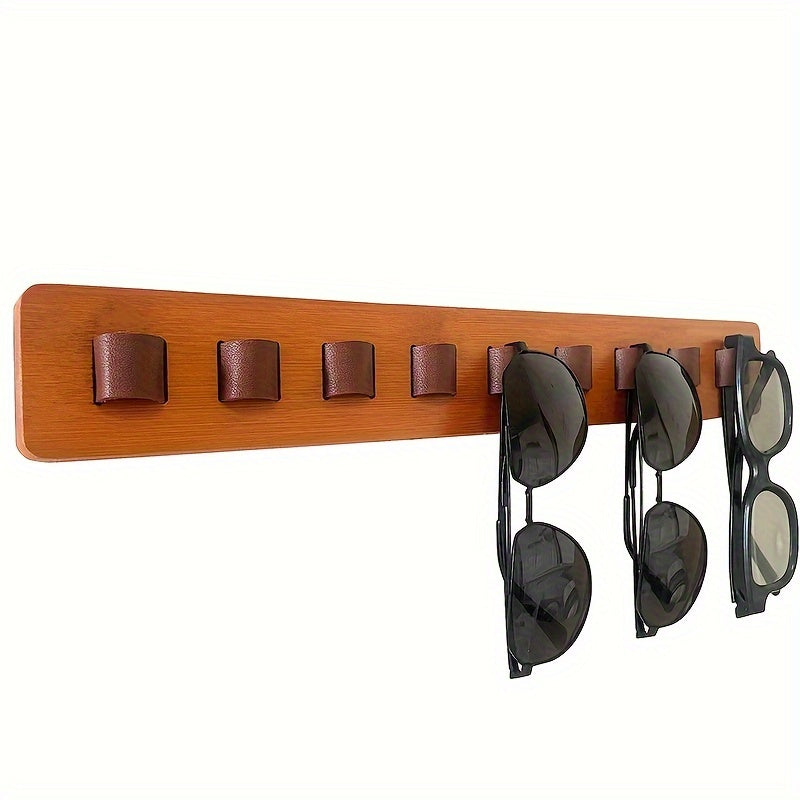 Wall-mounted glasses storage box made from modern simple wooden fashion, designed to display and store up to 9 glasses. This solid wood rack is perfect for holding glasses in a stylish and organized way. It can be mounted on the wall or used as a bedside