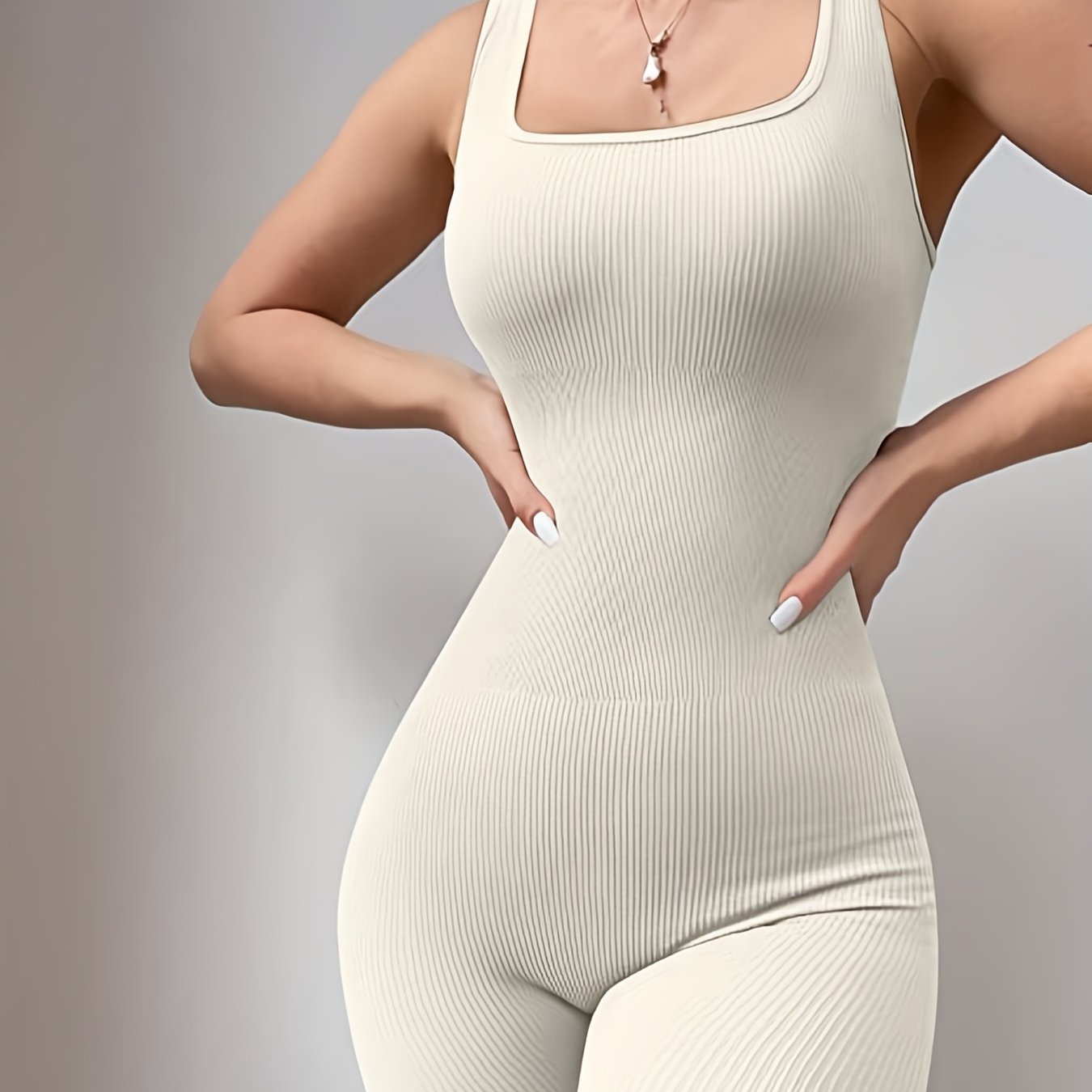 Ribbed solid color sports jumpsuit, high elastic yoga bodysuit for women's activewear.