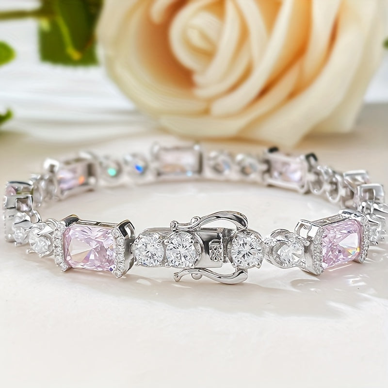 This stunning Sterling Silver Bracelet features dazzling Pink Cubic Zirconia stones. Ideal for everyday wear or as a thoughtful gift, especially for those born in October.