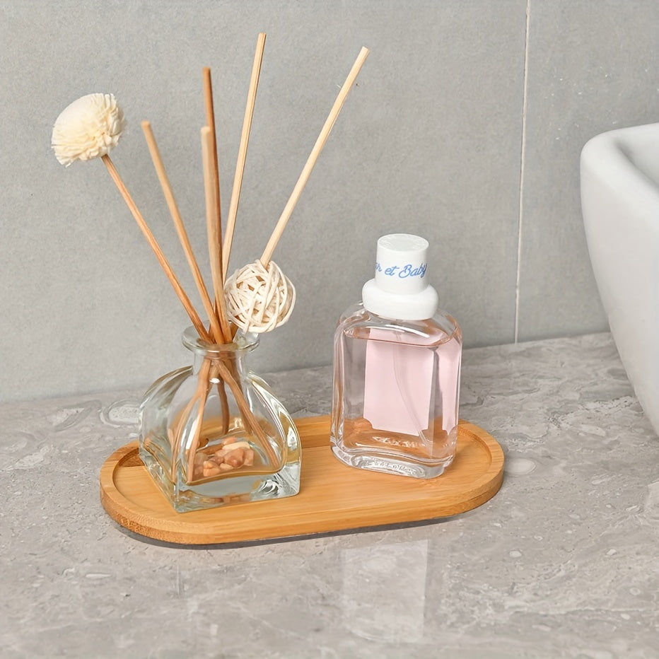 Bathroom storage tray with non-slip pad for organizing soap, perfume, makeup, and accessories. Ideal for home decor.