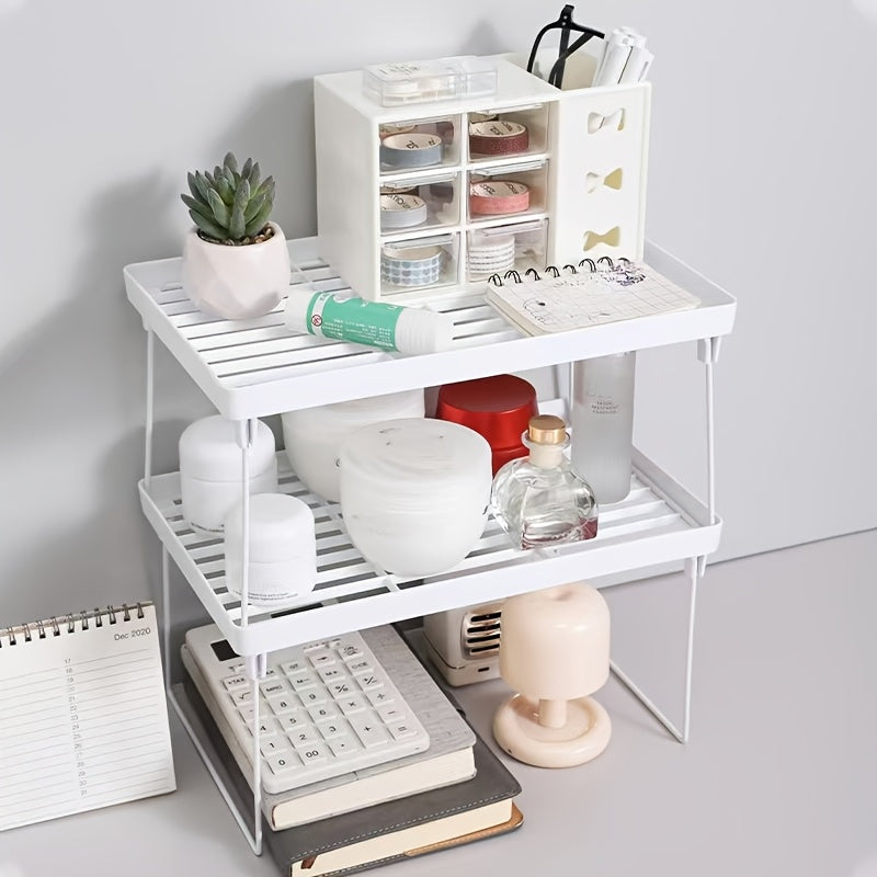 Single-tier iron shelf organizer with partition board for dormitory desktop storage. Made of non-electric plastic material, this tabletop storage cabinet is perfect for organizing your belongings.