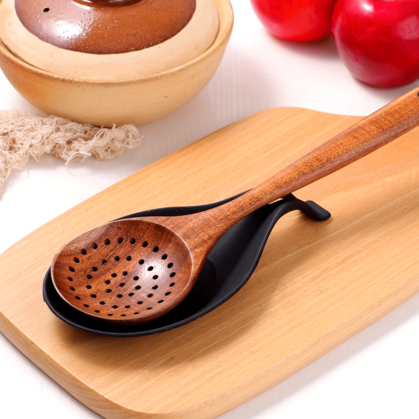 Durable, non-slip silicone spoon pad for kitchen utensils, heat-resistant and easy to clean.