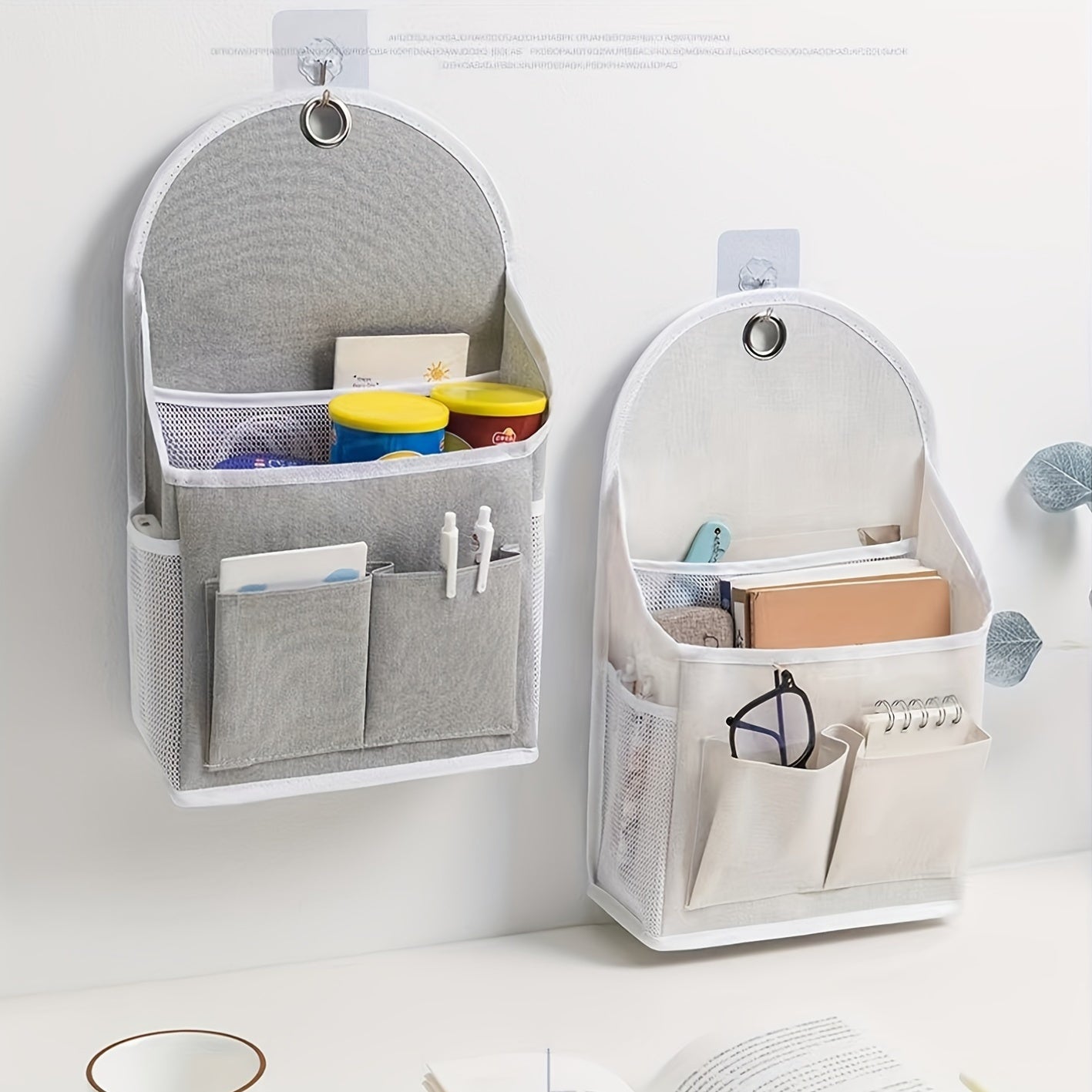 Wall-mounted storage organizer with dual pockets and mesh side compartment, ideal for dorms, wardrobes, homes, and offices. Comes in beige and grey, made of other materials.