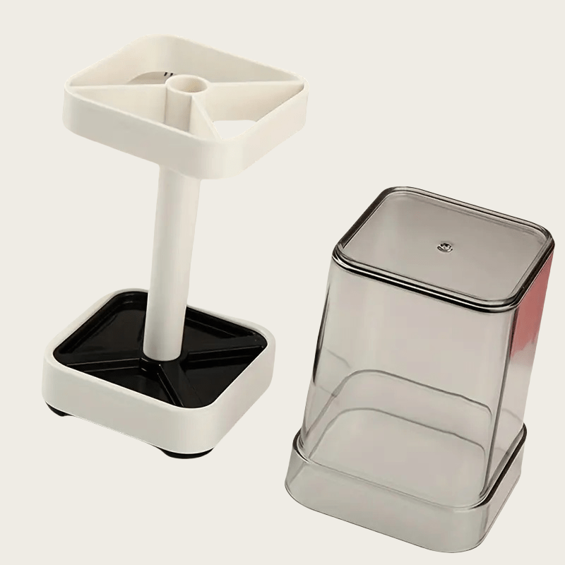 Modernize your bathroom with this sleek white toothbrush holder and cup lid combo. Perfect for organizing electric toothbrushes, toothpaste, dental floss, and razors with its 3 slots. Made from durable plastic, this organizer does not require power and