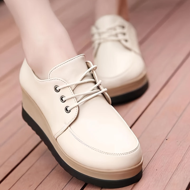 Women's lace-up low top shoes with solid color, comfortable all-season design, featuring a plain toe and PU sole. Made with man-made materials.