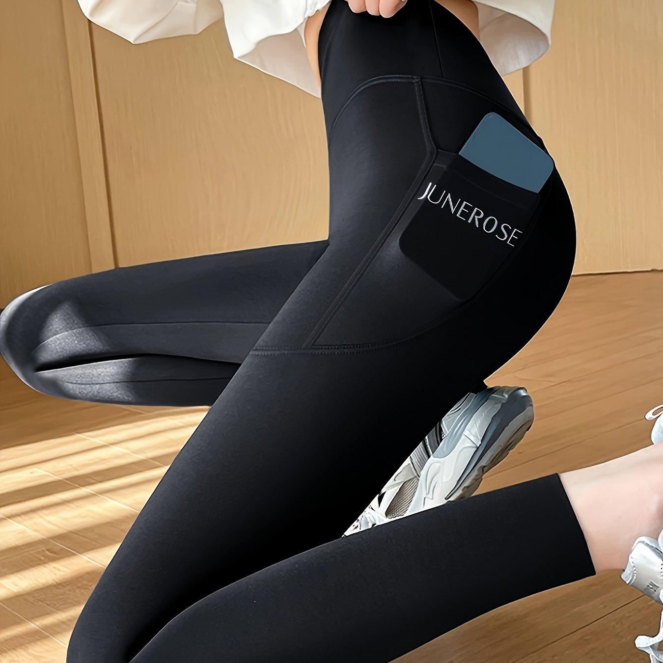 High waist compression pants with tummy control and pockets for women.