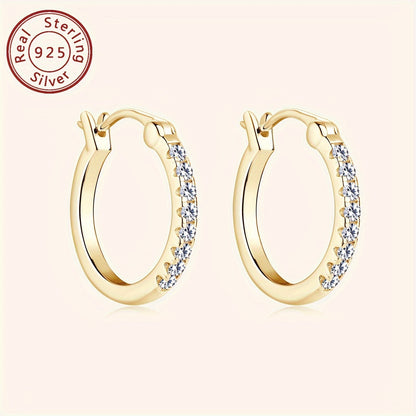 These elegant earrings are crafted from 925 sterling silver and feature a pair of round Moissanite stones. Each earring weighs approximately 3.94g and is adorned with 16 pieces of 1.8mm Moissanite stones, totaling 0.4 carats per pair. Perfect for adding