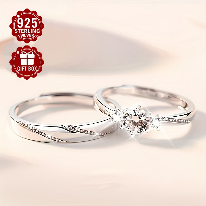 Set of 2 925 Pure Silver Couples Rings with Synthetic Zirconia, featuring 'Love at First Sight' design and openable ring. Each ring weighs approximately 4.6g. Perfect for engagement gifts or love tokens.