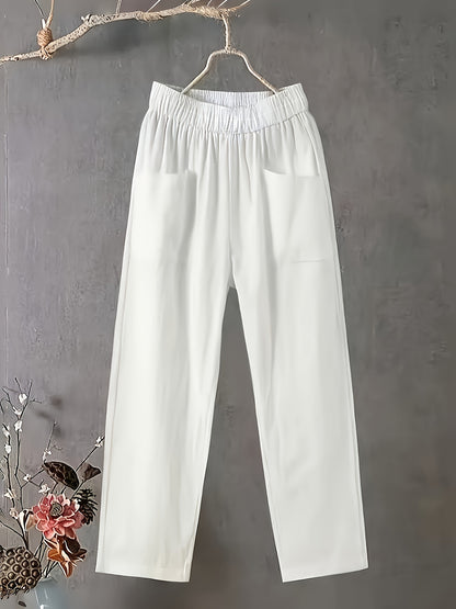 White harem style pants for plus size women, made of lightweight polyester with elastic waistband. Machine washable for spring, summer, and fall seasons.