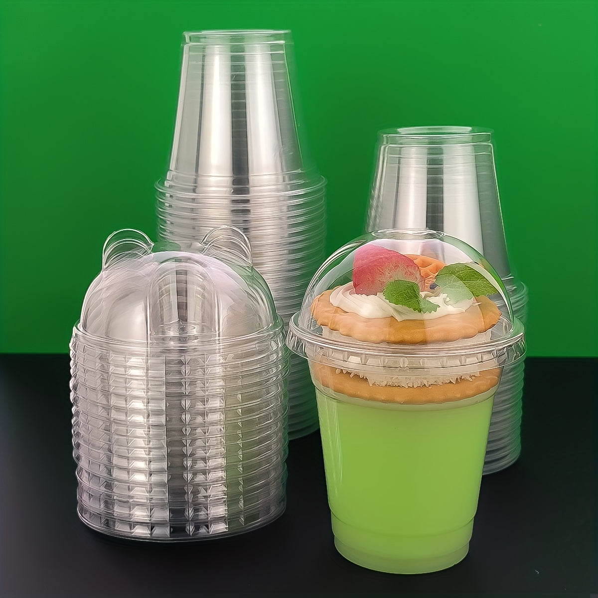 50 pieces of transparent plastic cups with lids, each holding 9oz to 10oz. Perfect for festivals, parties, serving cold drinks, desserts, and coffee. Essential party supplies for any occasion. Add these drinkware accessories to your collection!