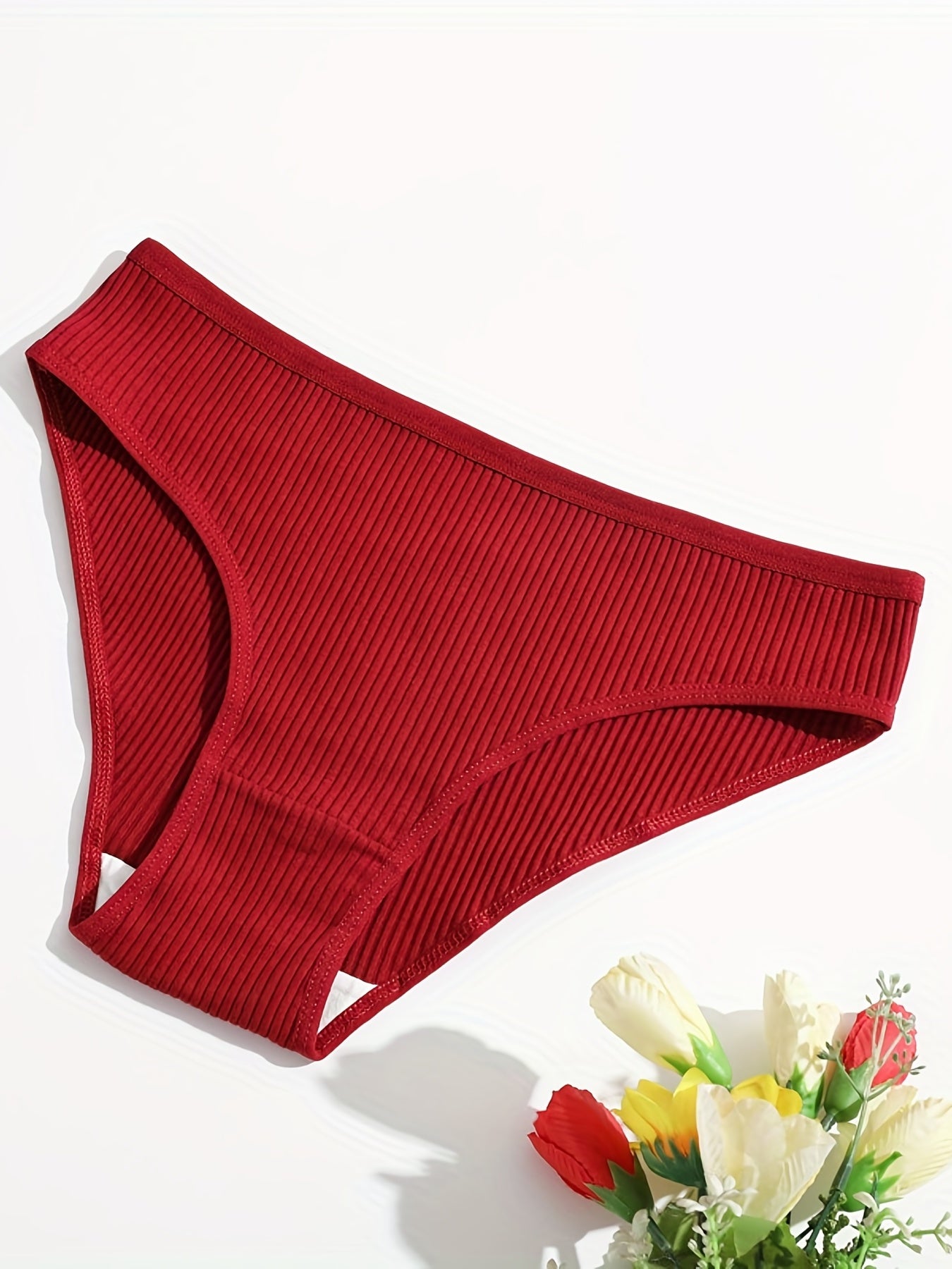 5 comfortable women's briefs with butt lift, low-rise, breathable, double-layered, available in red, gray, teal, orange, and black solid colors. Made of soft ribbed stretch material.