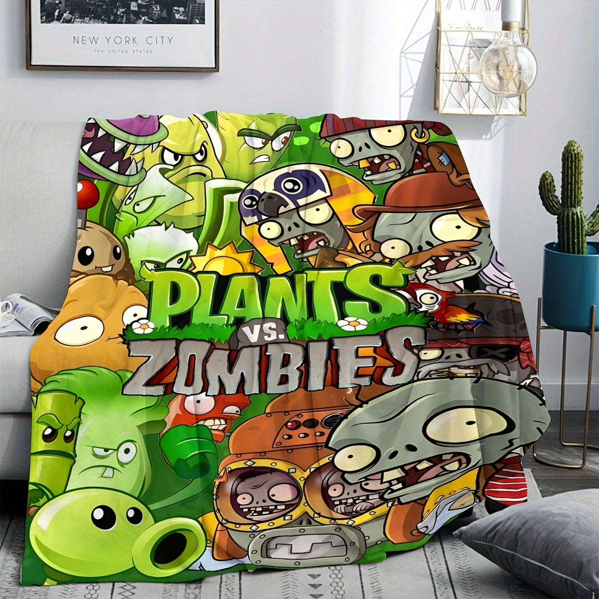 Stay cozy with this Plants vs Zombies printed fleece throw blanket, featuring a contemporary design in mixed colors. Made from knitted fabric, this machine washable blanket is perfect for all seasons. The digital print adds a fun touch, making it a great