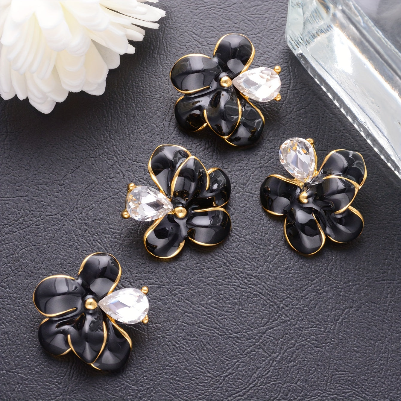 Set of four elegant alloy flower brooch pins, perfect for adding a decorative touch to shirts, sweaters, coats, and more. Use them to accessorize handbags, gift boxes, shoes, and bouquets for a stylish and personalized look.