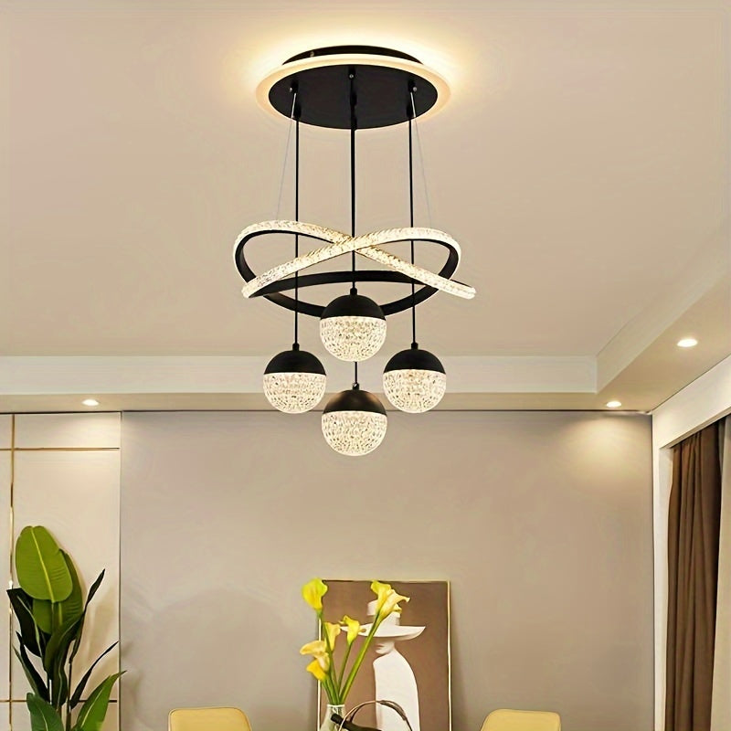 Contemporary LED chandelier with crystal embellishments and metal construction - perfect for dining rooms, living rooms, clothing stores, bars, and staircases. Includes installation hardware and features a simple, modern design. Ideal for apartments.