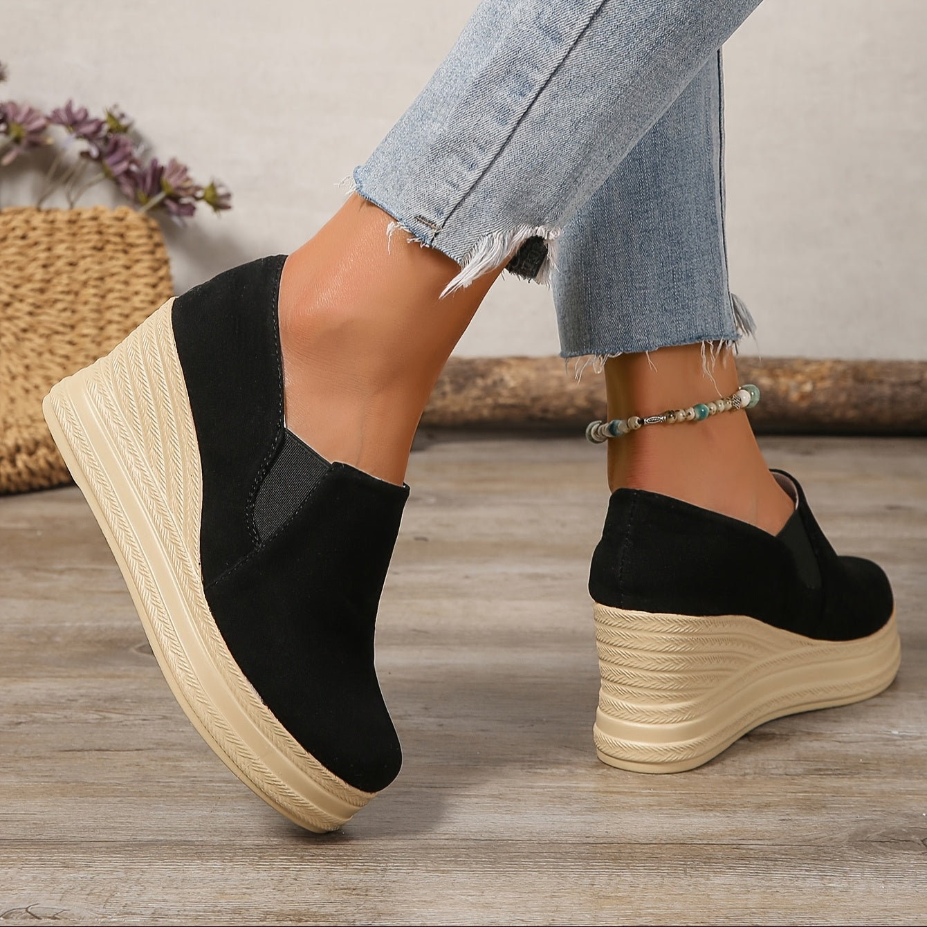 Women's platform wedge sneakers with high heels and slip-on design, featuring faux sole and fabric insole for all-season comfort.