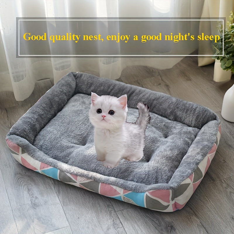 Rectangle pet bed with blue cartoon design, soft and comfortable for small to medium breeds. Made with polyester fiber fill.