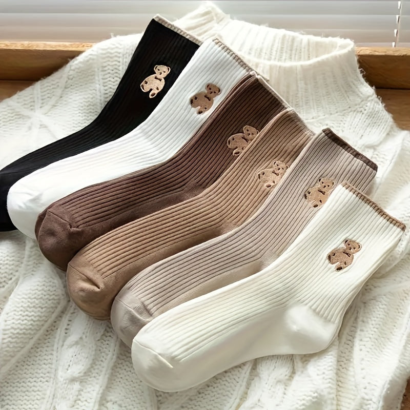 5 pairs of cute cartoon bear embroidered crew socks for women made from soft, breathable polyester knit with spandex. Hand wash recommended. Ideal for casual or sports wear.