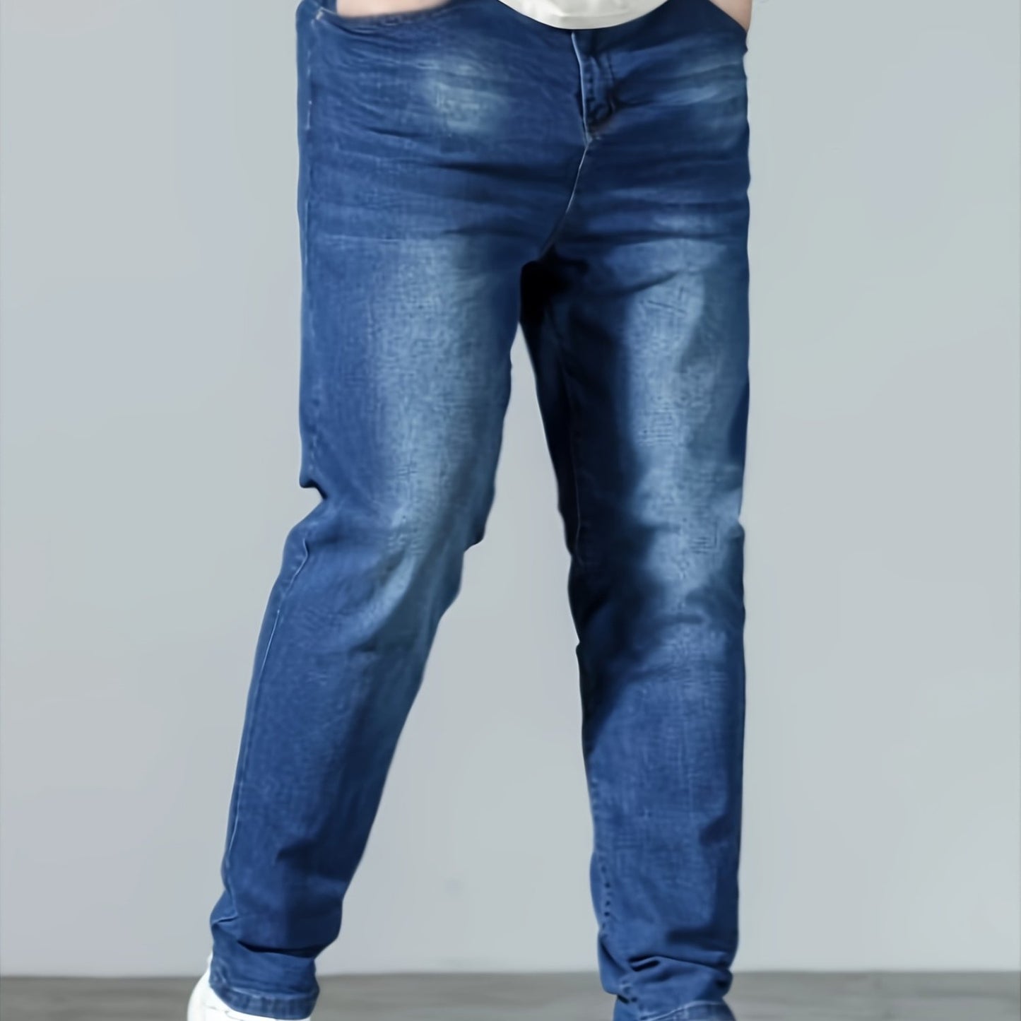 Plus size men's casual skinny fit denim jeans with medium stretch, solid color, pockets, suitable for all seasons.