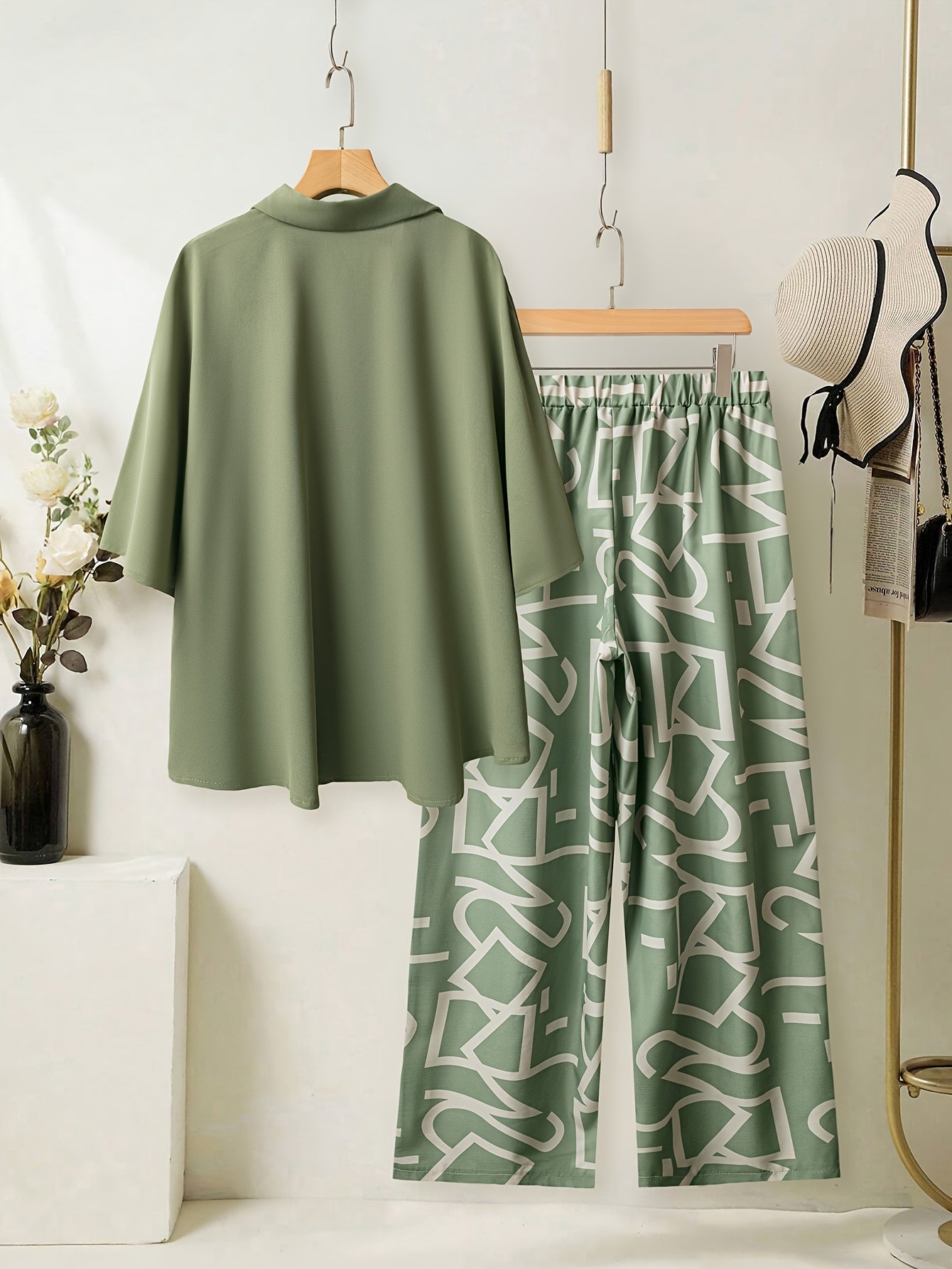 Women's large size elegant two-piece set - shirt and pants.