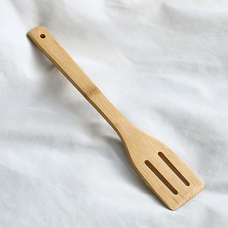 Bamboo wood spatula for non-stick cooking, perfect for Halloween and Christmas.