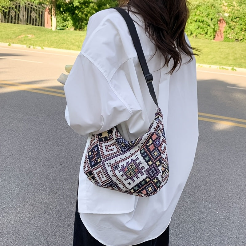 Single shoulder tote bag from the new spring and summer collection, perfect for daily use. Features stylish and versatile design with random zip direction and pattern printing.