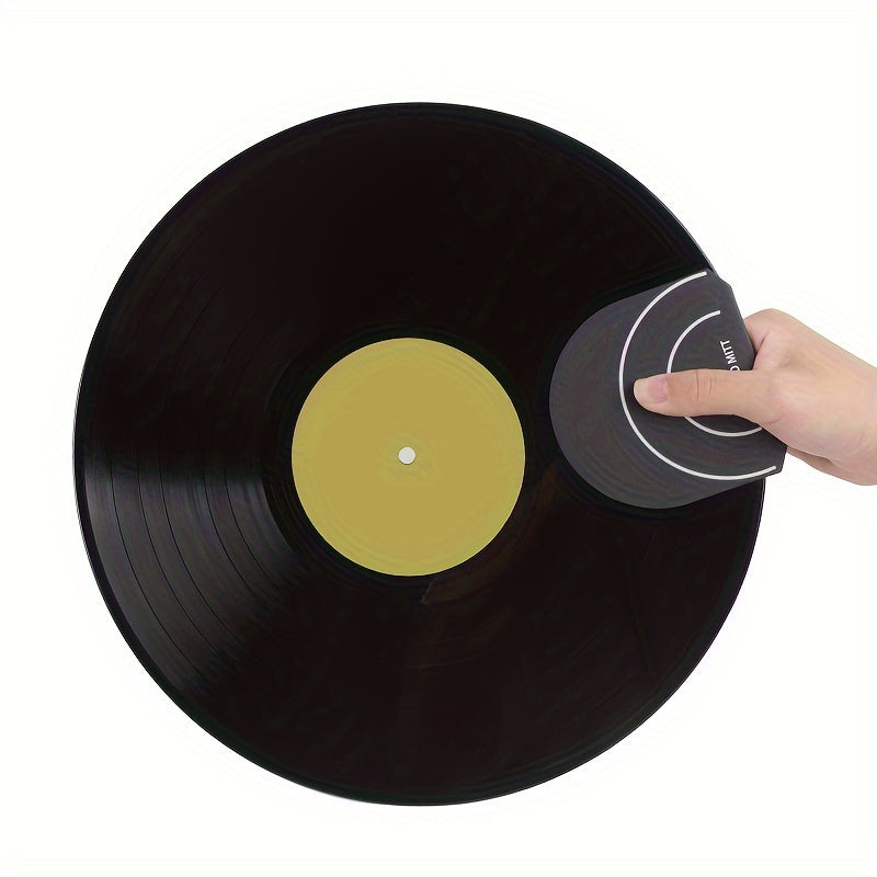 Microfiber vinyl record protector mitten for collectors, prevents scratches and dust buildup.