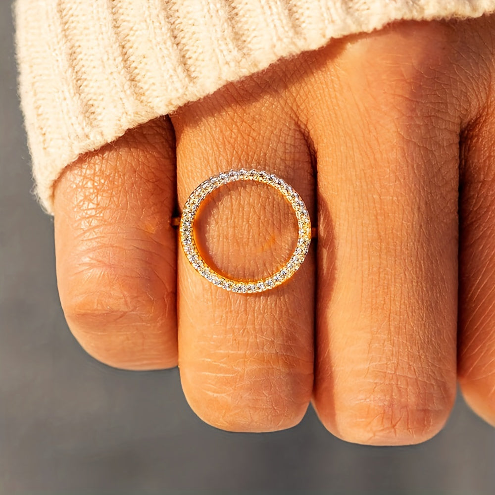 High quality jewelry featuring a sparkling circle design paved with shining zirconia stones, this 925 sterling silver ring is plated with 14k gold. Choose from golden, silvery, or rose golden tones to suit your preference.