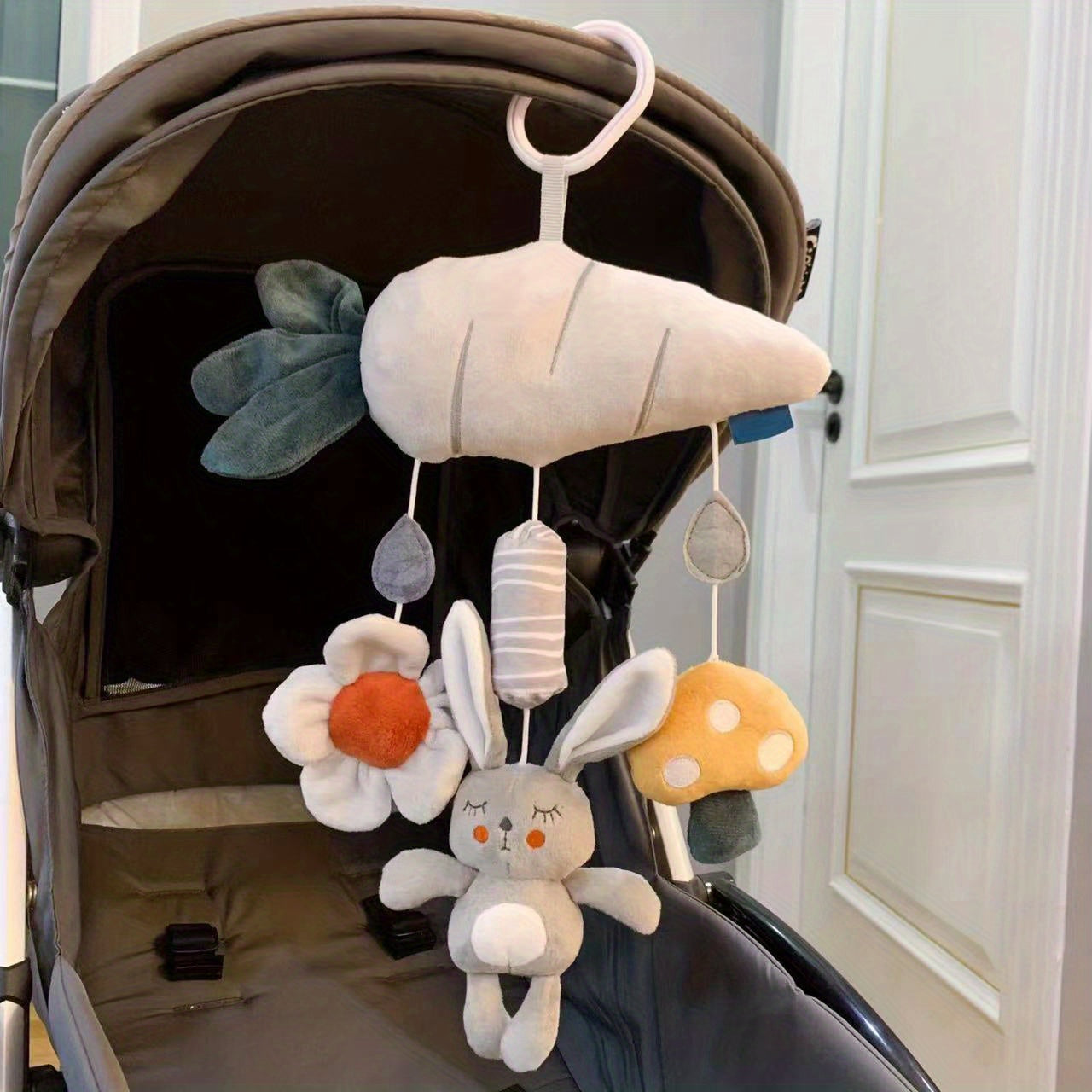 Soft plush animal wind chime, ideal for attaching to baby's car seat, stroller, or crib!