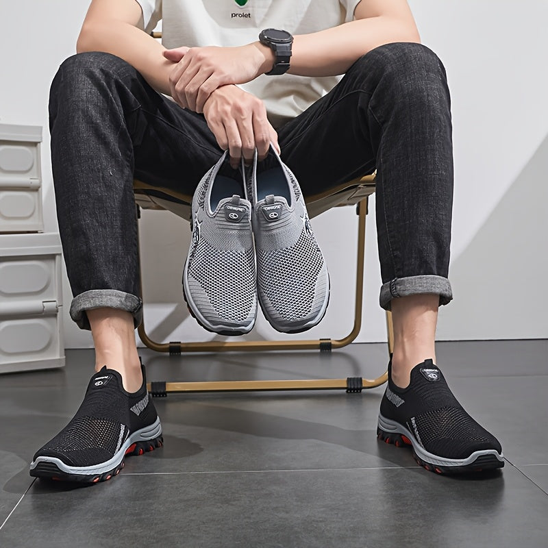 Men's slip-on athletic sneakers with breathable mesh upper, rubber sole, and casual sports style for spring/summer.