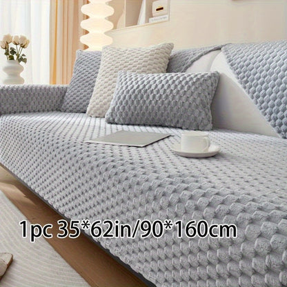 Non-slip sofa cover with honeycomb pattern, ideal for all seasons and protecting furniture in any room.