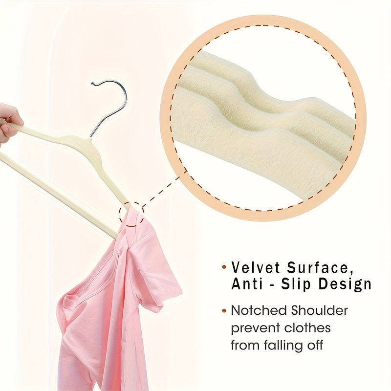 Get a 50 pack of cute and durable velvet baby hangers for your closet! These non-slip toddler hangers are the perfect size at 29.97 cm for your child's clothes. Perfect for newborns and children.