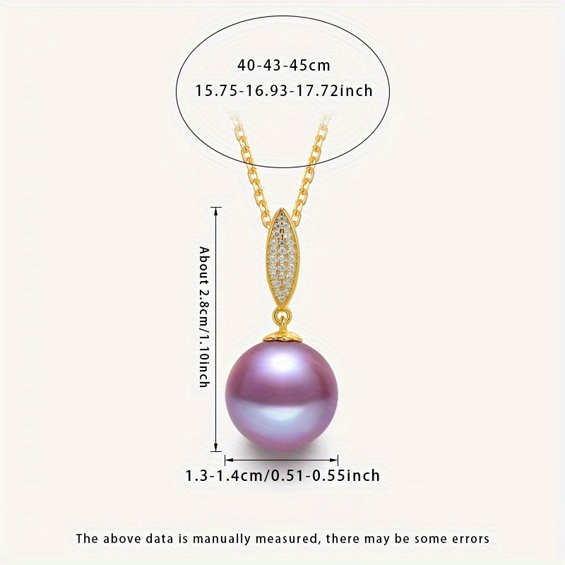 This stunning pendant necklace features a 13-14mm round natural freshwater pearl in an elegant shade of purple. The gemstone may have minor imperfections, adding to its unique beauty. The pendant is crafted from S925 silver and comes with a gift box