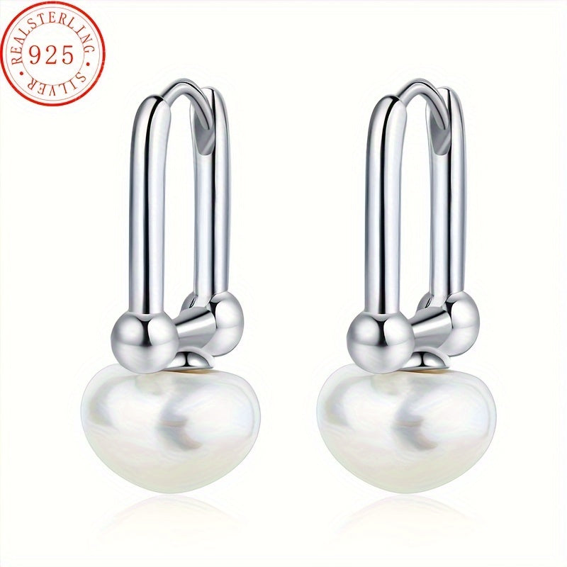 High quality and hypoallergenic jewelry made with 925 sterling silver dangle earrings featuring inlaid freshwater pearls. Perfect for daily outfits or party accessories.