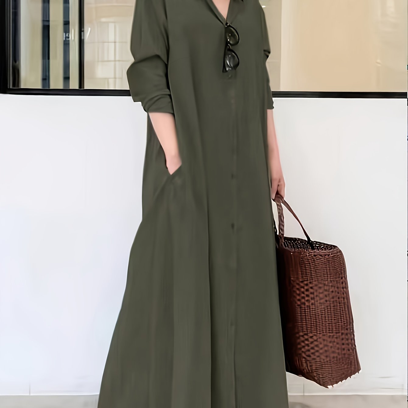 Button front shirt dress in solid color, loose fit maxi style with long sleeves for spring and fall.