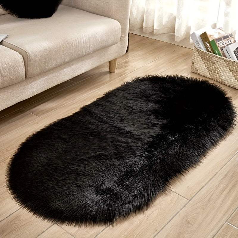 Soft and plush faux sheepskin oval area rug, perfect for adding a cozy touch to any living room or bedroom. Machine washable and designed to be used as a bedside rug. This shaggy plush carpet will enhance your home decor and add a touch of luxury to any