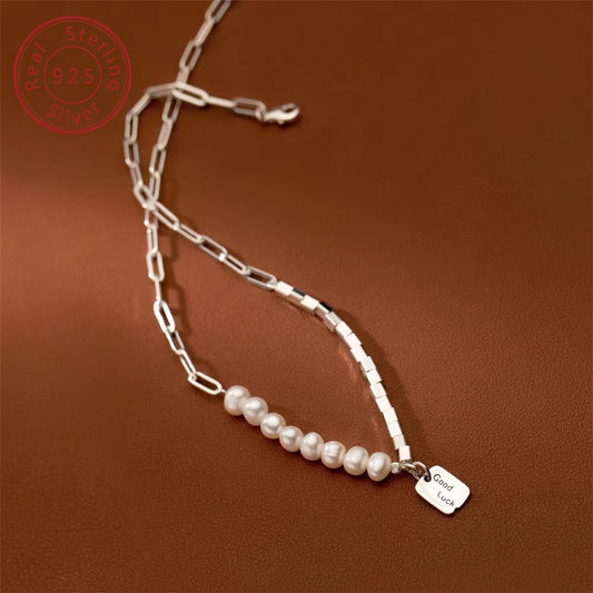 Beautifully handcrafted Shell Pearl decorated necklace made of genuine S925 Sterling Silver. This elegant and luxurious piece is a unique design with a tag pendant, making it the perfect jewelry gift for your girlfriend. Weighing 15.3g/0.54oz, this