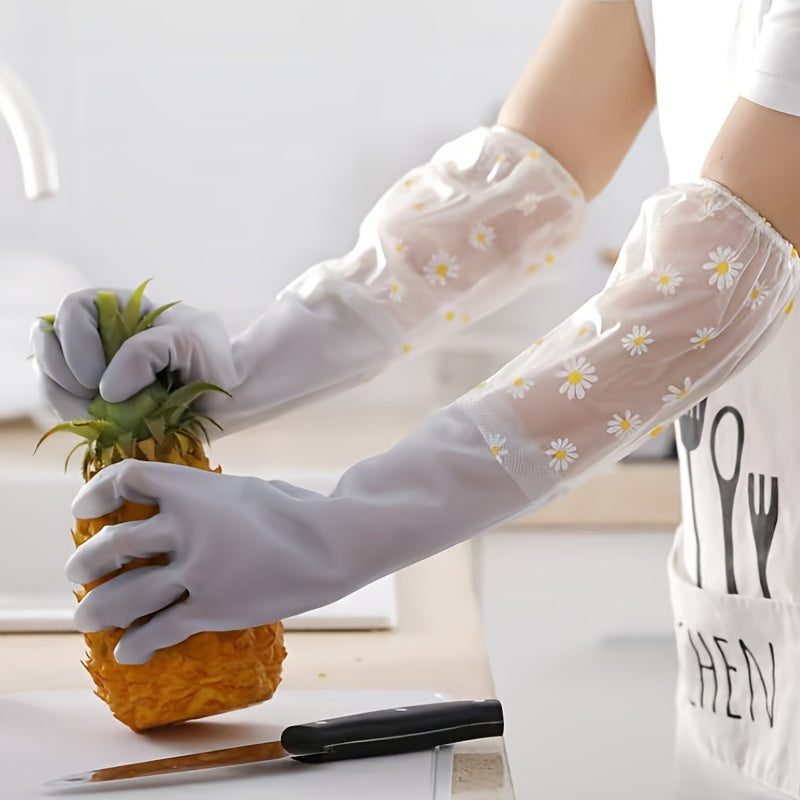 Two waterproof PVC cleaning gloves featuring a colorful daisy pattern, designed for a secure grip while washing dishes. Ideal for use in the kitchen, home, laundry, bathroom, toilet, living room, and bedroom. These gloves are non-toxic, multifunctional