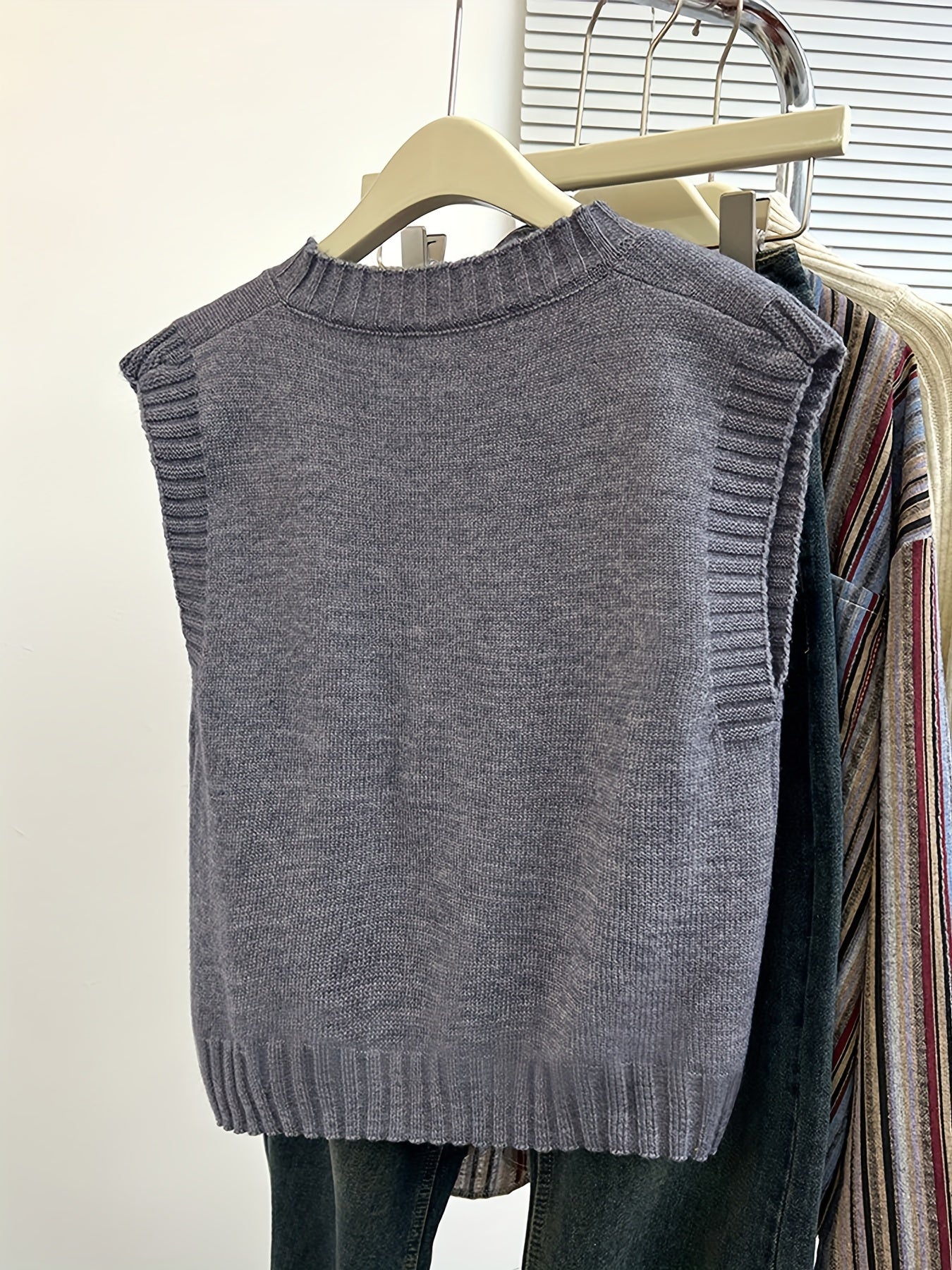 Sleeveless V-neck sweater vest for women, perfect for fall and winter