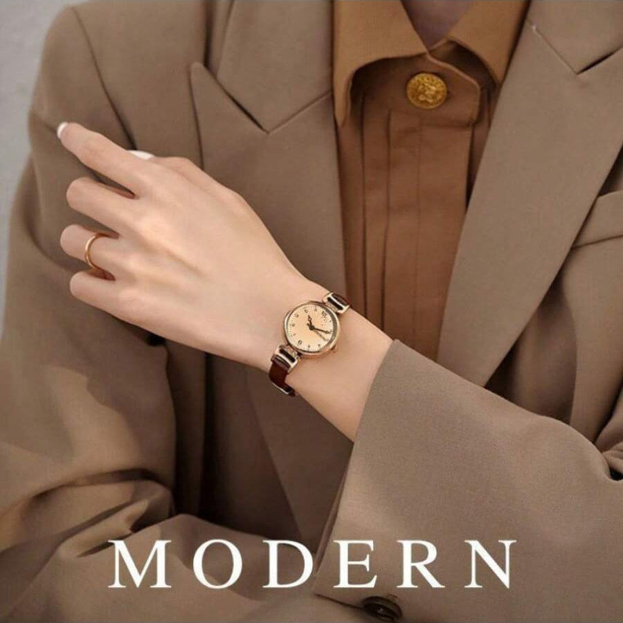 Elegant vintage-inspired women's watch with quartz movement and synthetic leather strap, non-rechargeable button battery.