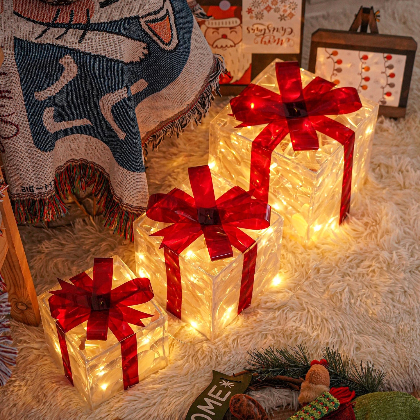 3 Christmas lighted gift boxes with warm white lights and red bows for decorating Christmas trees, yards, homes, and outdoor spaces.